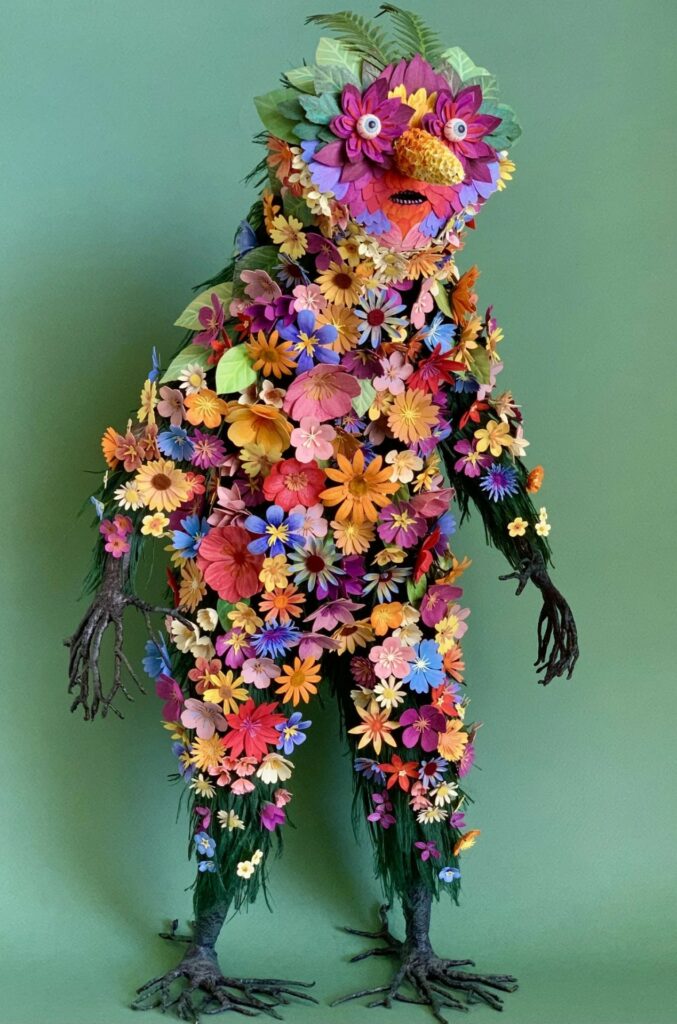 sculpture anthropomorphe de fleurs et de bois personnifiant le printemps