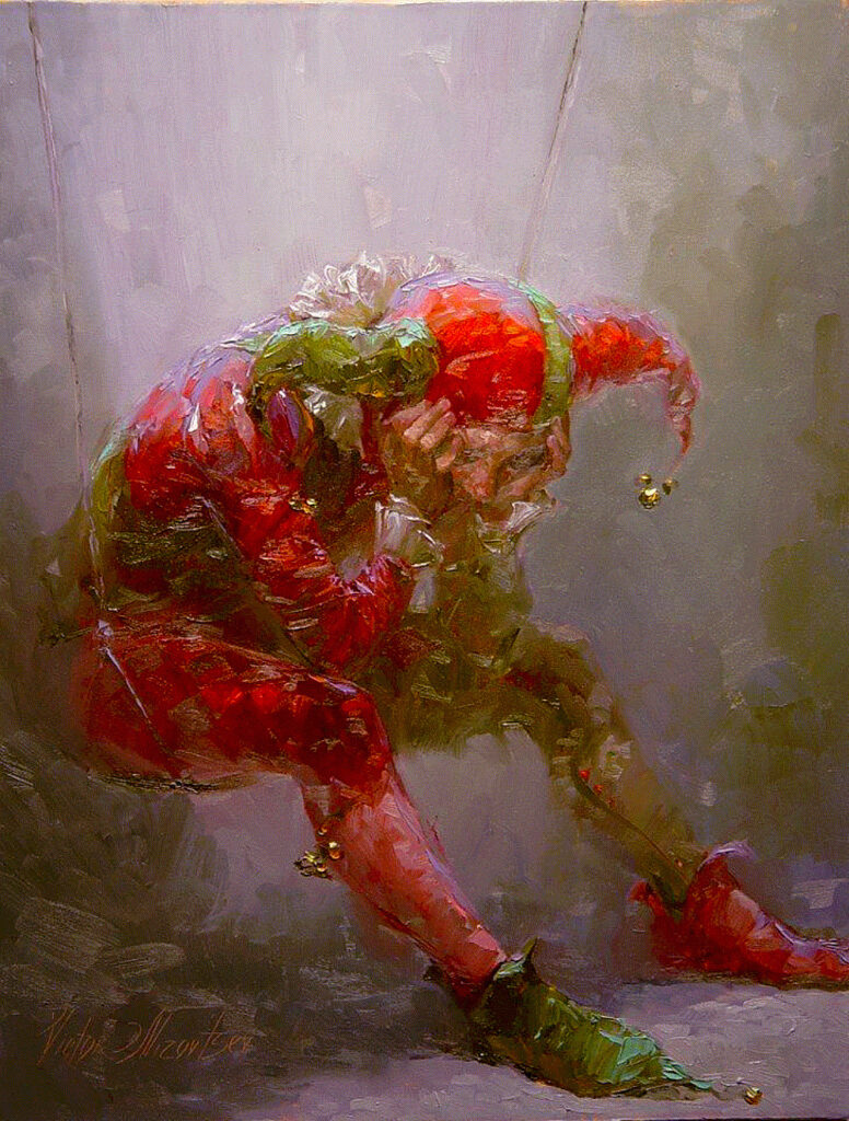 un Arlequin assis la tête entre les mains